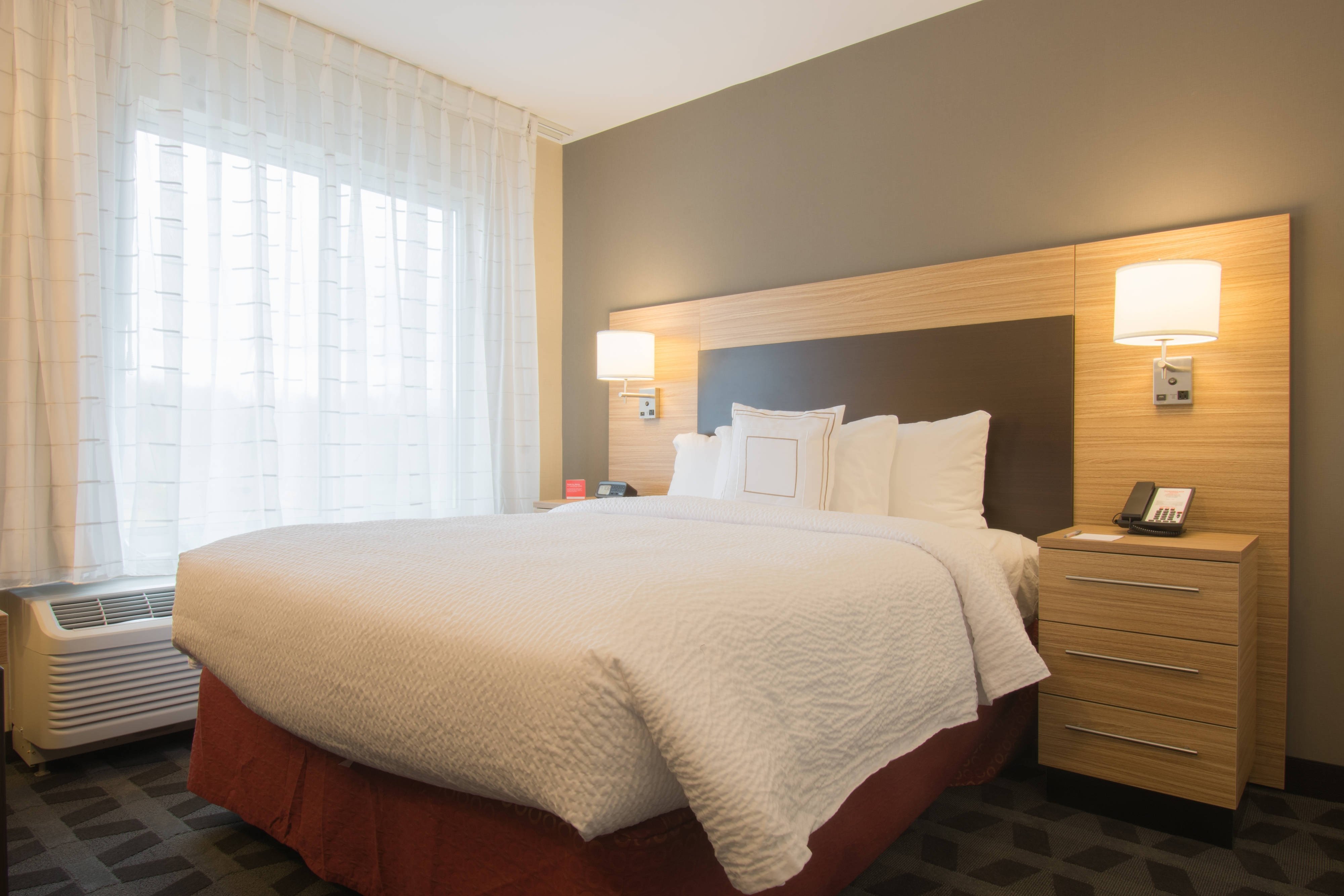 TownePlace Suites by Marriott Syracuse Liverpool-guestroom-One-Bedroom Suites - Sleeping Area.jpg