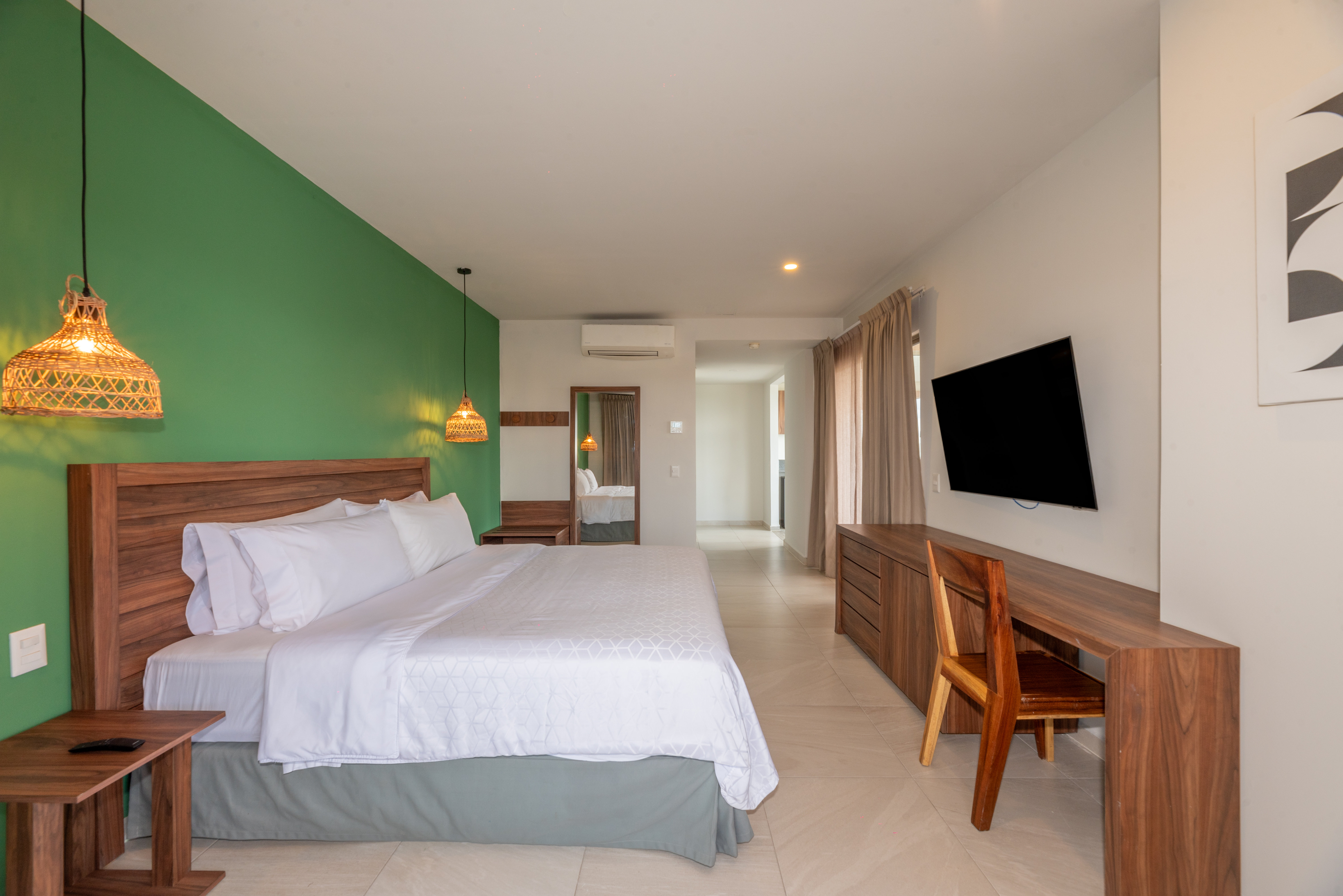 HOLIDAY INN TULUM DOWNTOWN BY IHG-guestroom-Sleeping Room king bed suite.jpg
