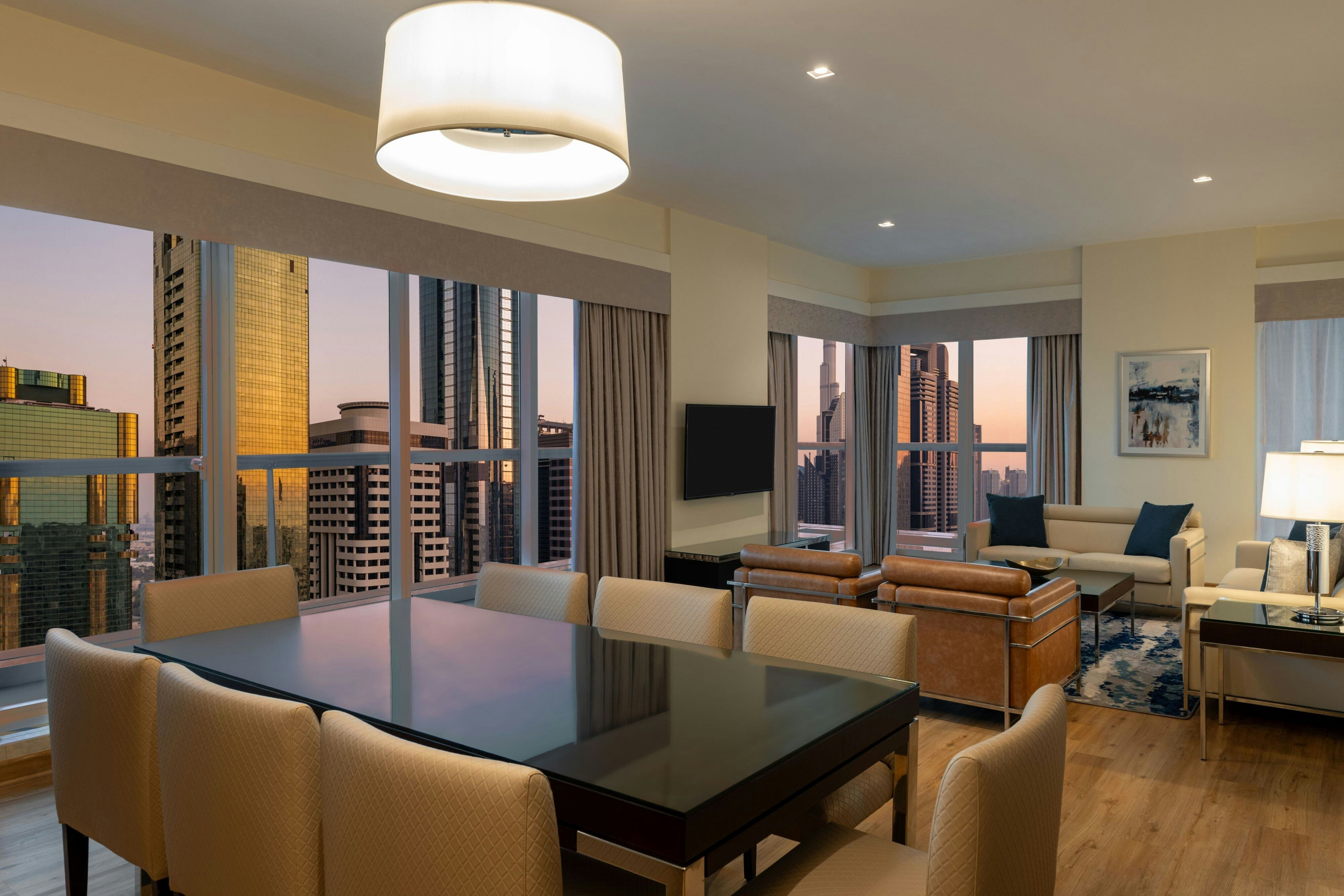 Four Points by Sheraton Sheikh Zayed Road Dubai-guestroom-Two Bedroom Suite - Living Room.jpg
