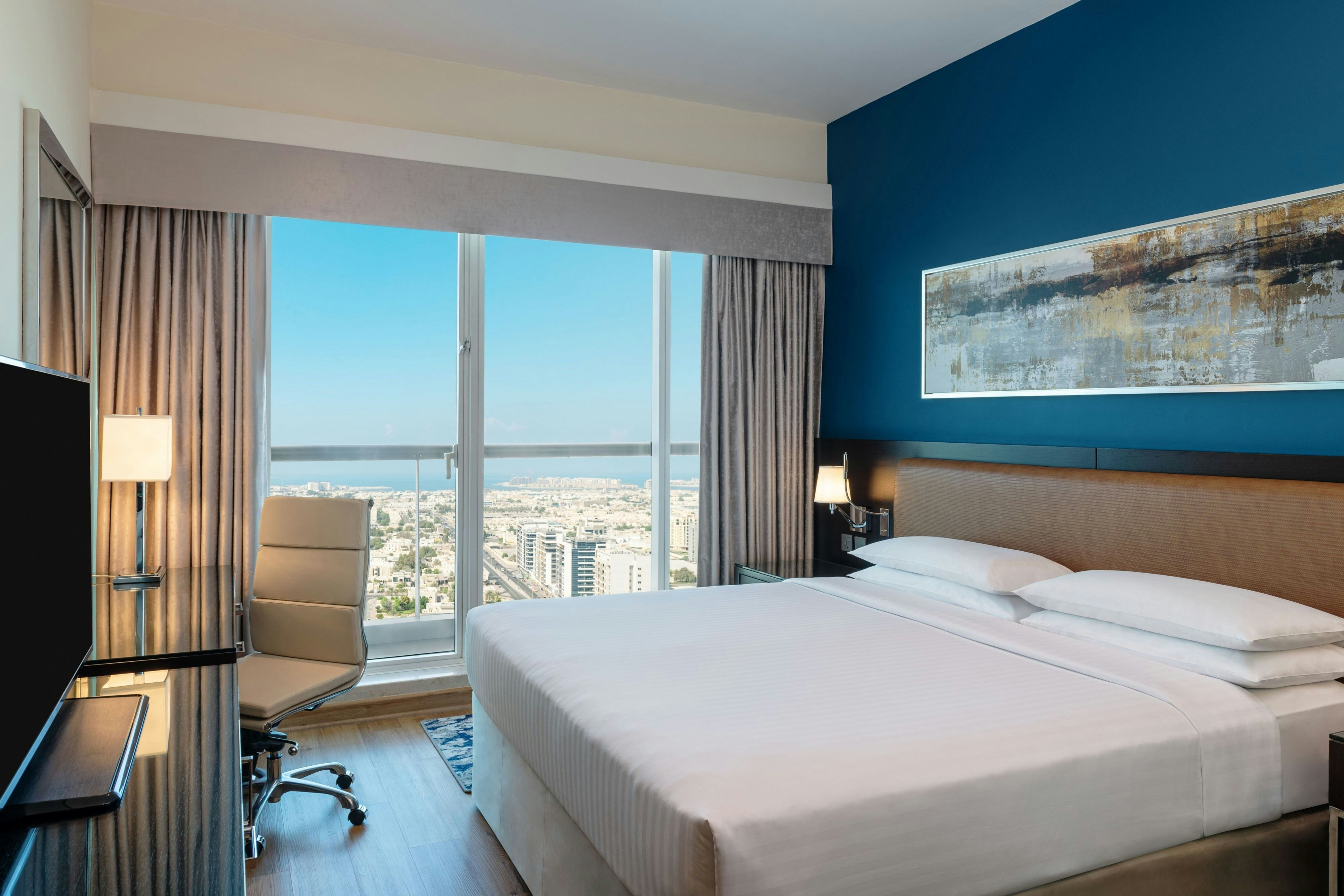 Four Points by Sheraton Sheikh Zayed Road Dubai-guestroom-One Bedroom Suite - Bedroom.jpg