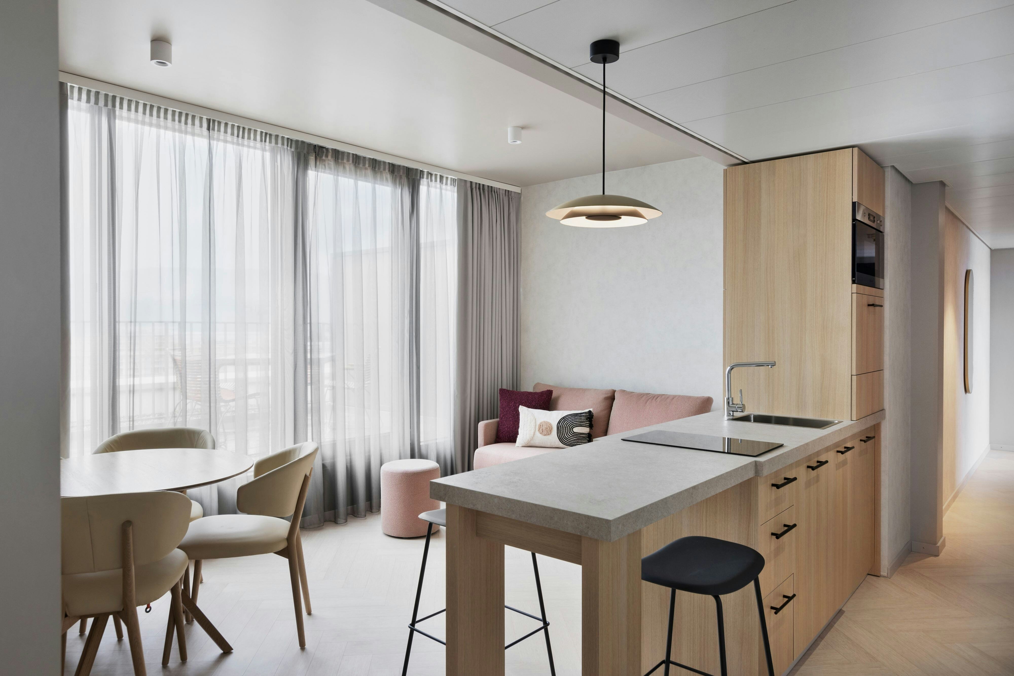 Residence Inn by Marriott Geneva City Nations-guestroom-Two-Bedroom Suite Living Area.jpg
