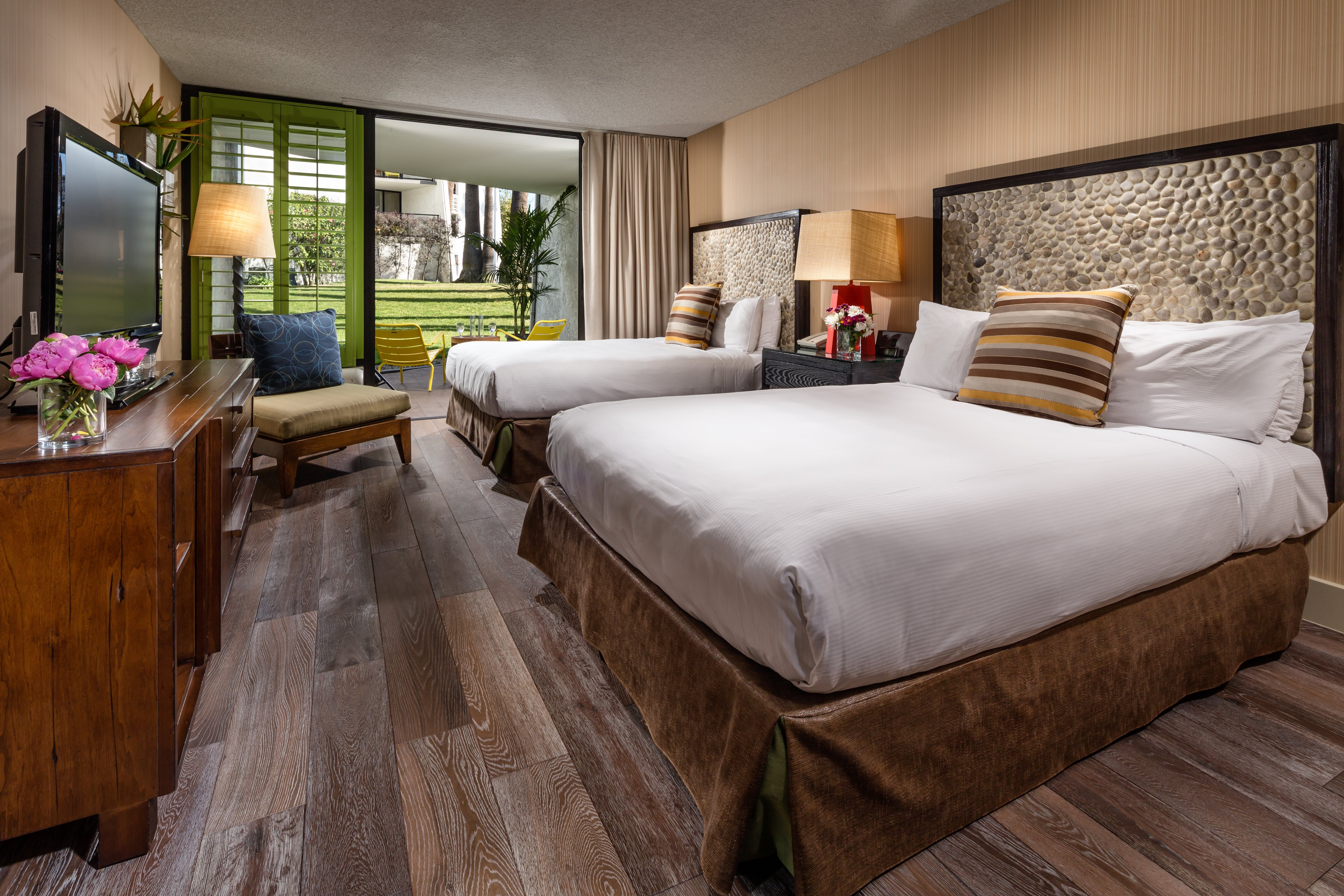 HOTEL MAYA - A DOUBLETREE BY HILTON-guestroom-a bedroom with a large bed in a hotel room.jpg