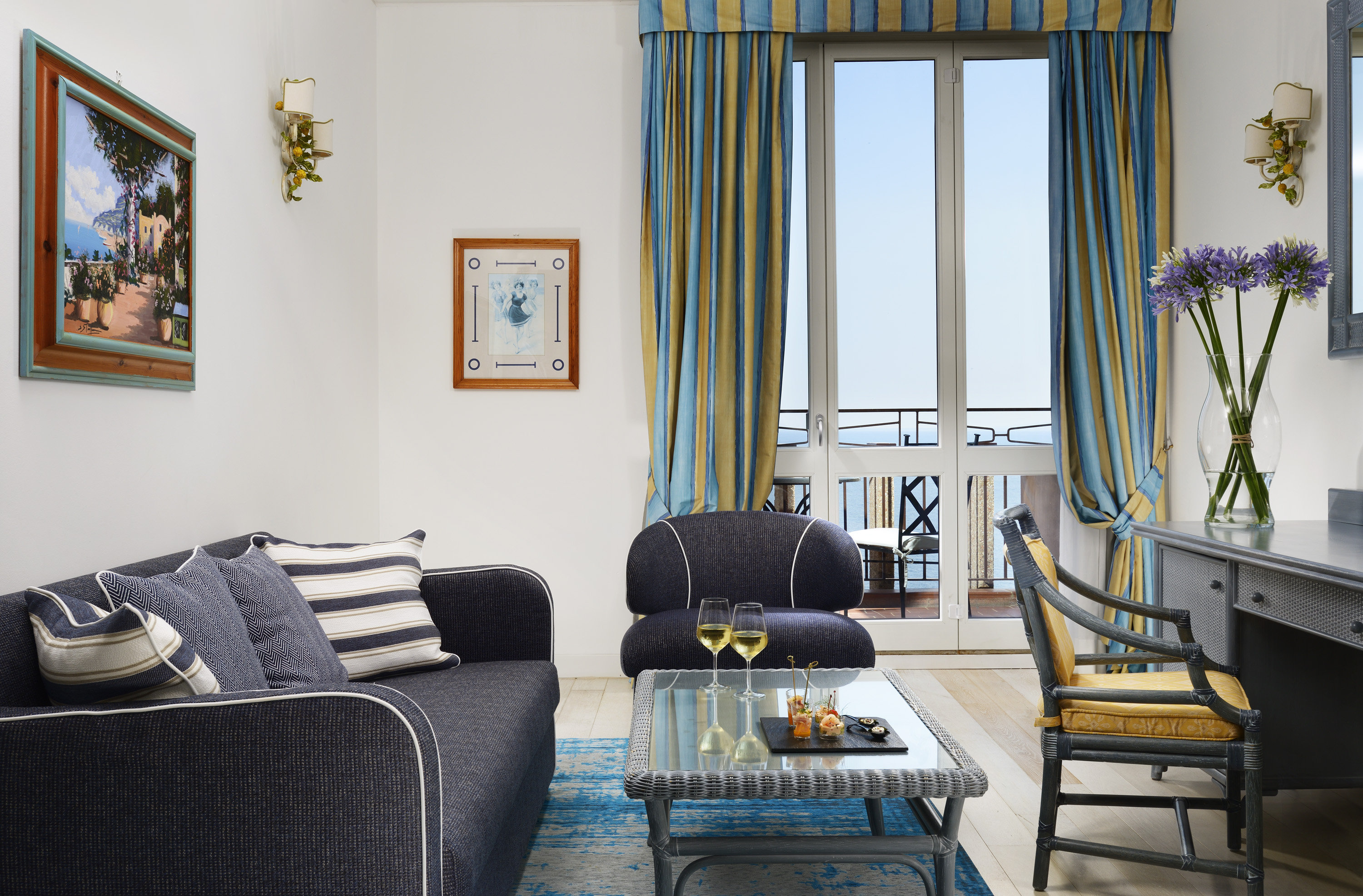 UNA Hotels Capotaormina-guestroom-Suite Living Room.jpg