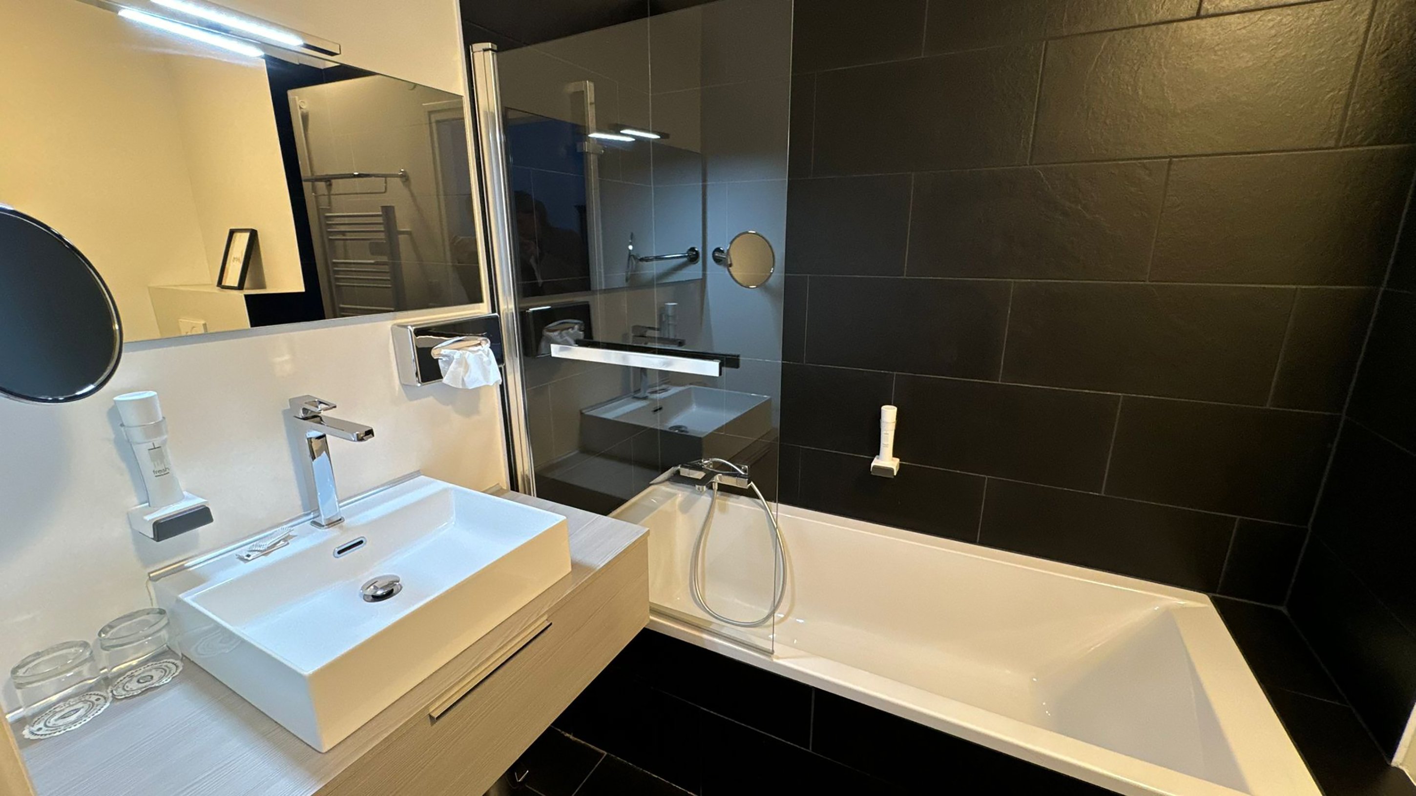 Hotel Le Bourgogne-guestroom-Deluxe Room & Lake View Room Bathroom.jpg