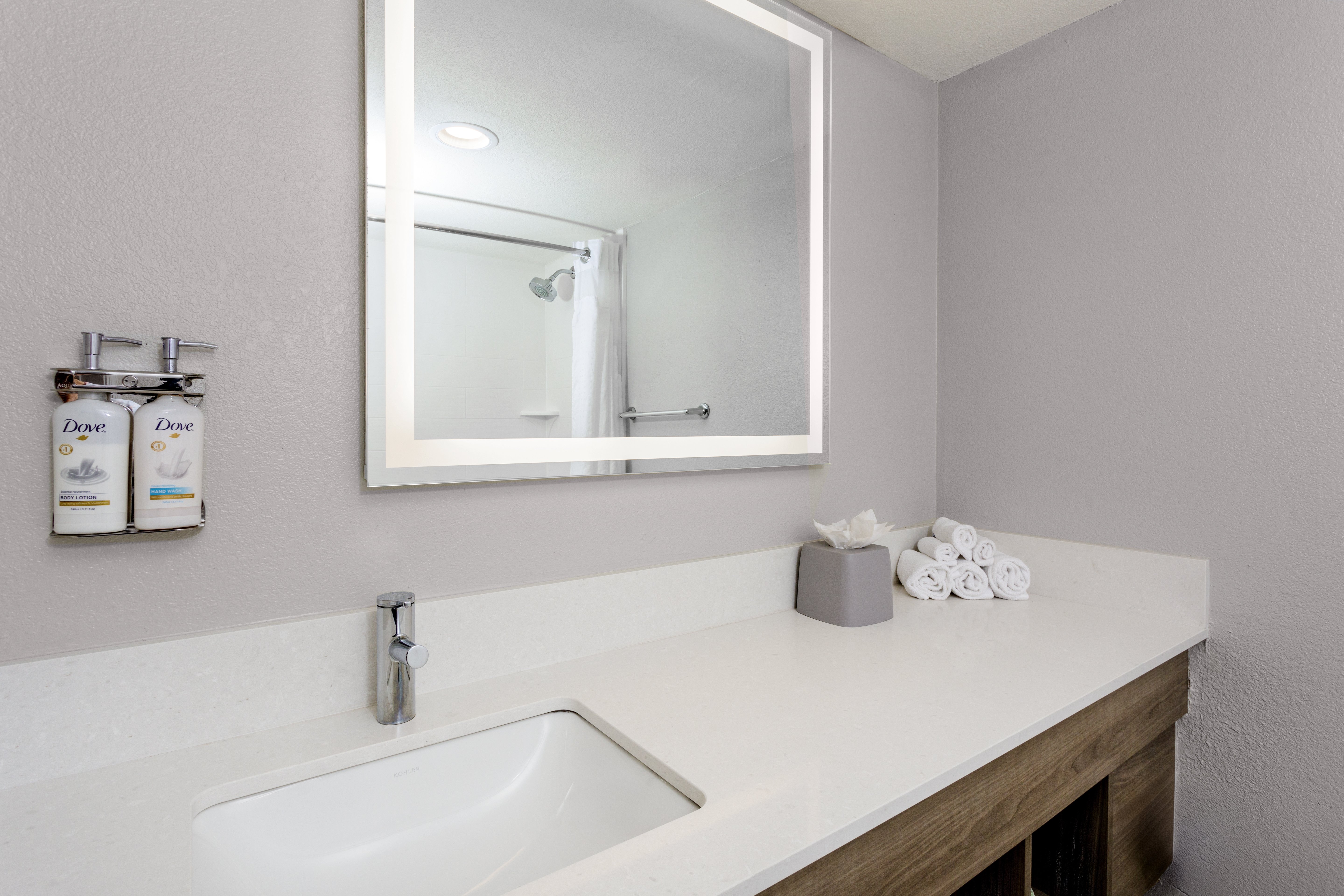 HOLIDAY INN EXP STES OCEANFRON-guestroom-1 King Deluxe Standard Bathroom.jpg
