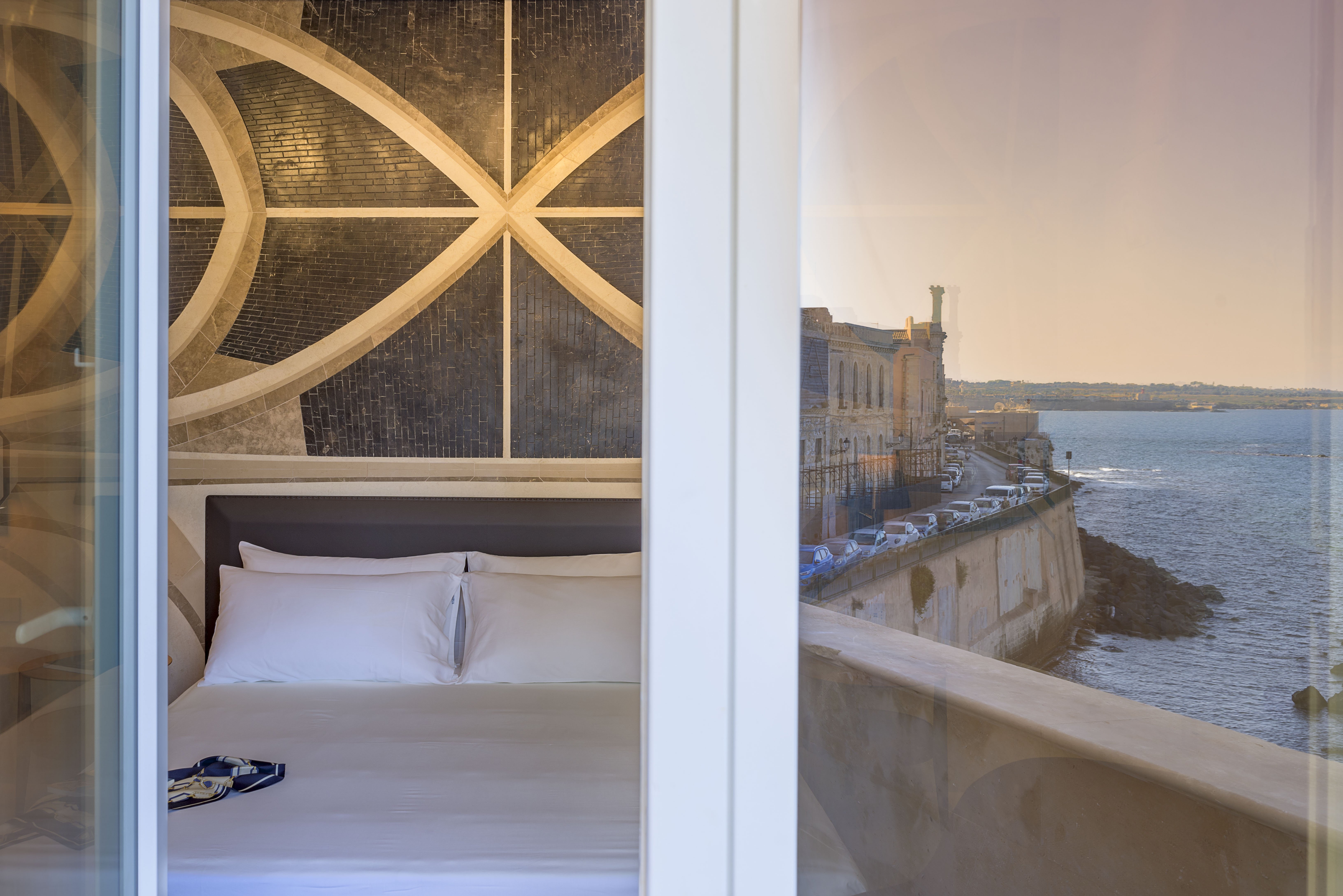 Maniace Boutique Hotel Ortigia-guestroom-Federico II Junior Suite Sea View Jacuzzi Ortigia View.jpg