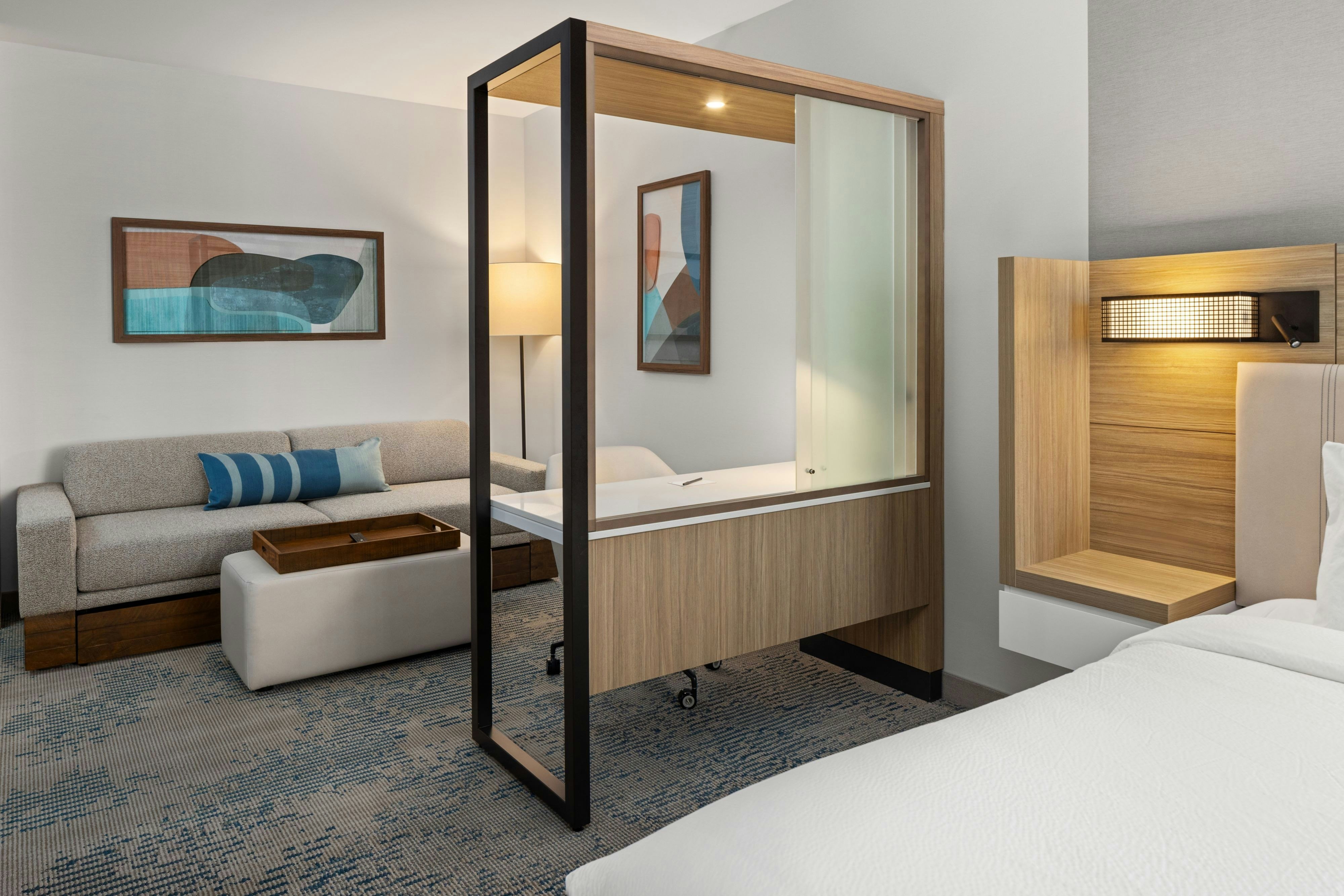 SpringHill Suites by Marriott Bettendorf-guestroom-King Living Area.jpg