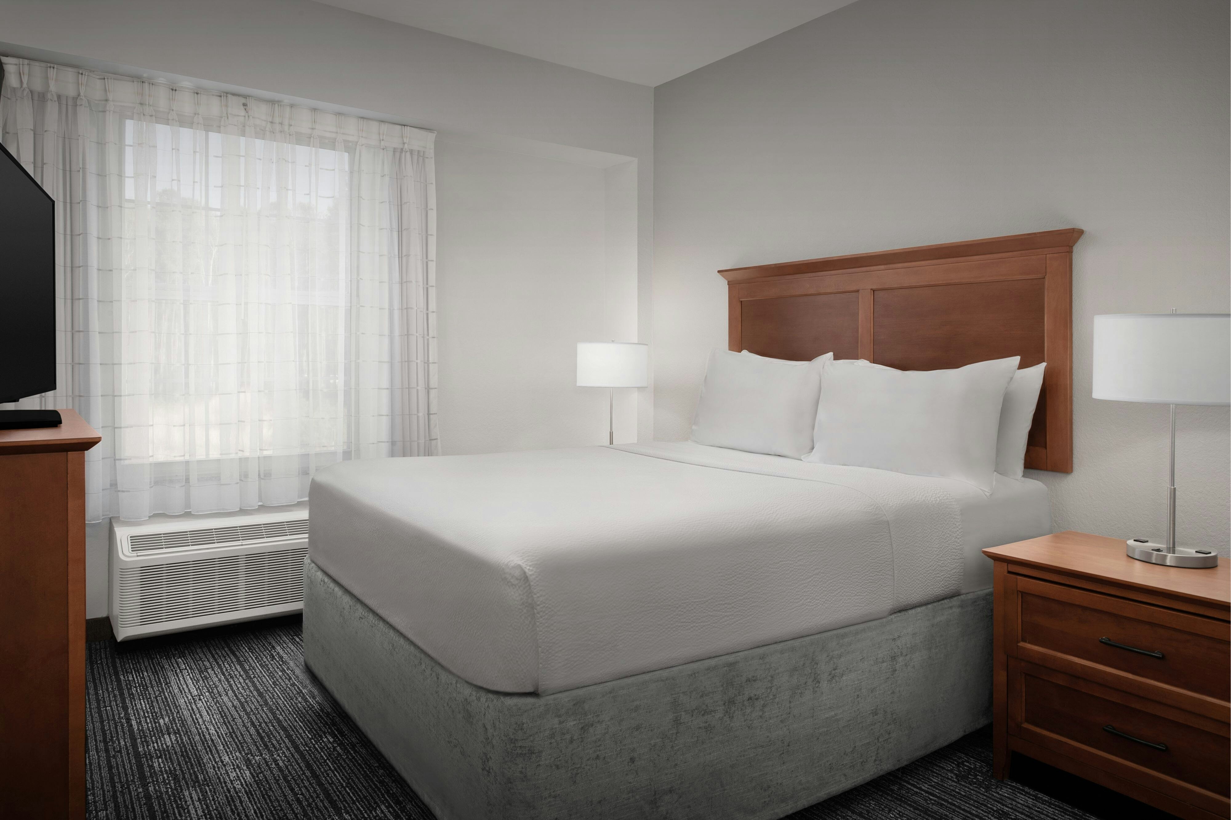 TownePlace Suites by Marriott Suffolk Chesapeake-guestroom-One-Bedroom Suite - Sleeping Area.jpg