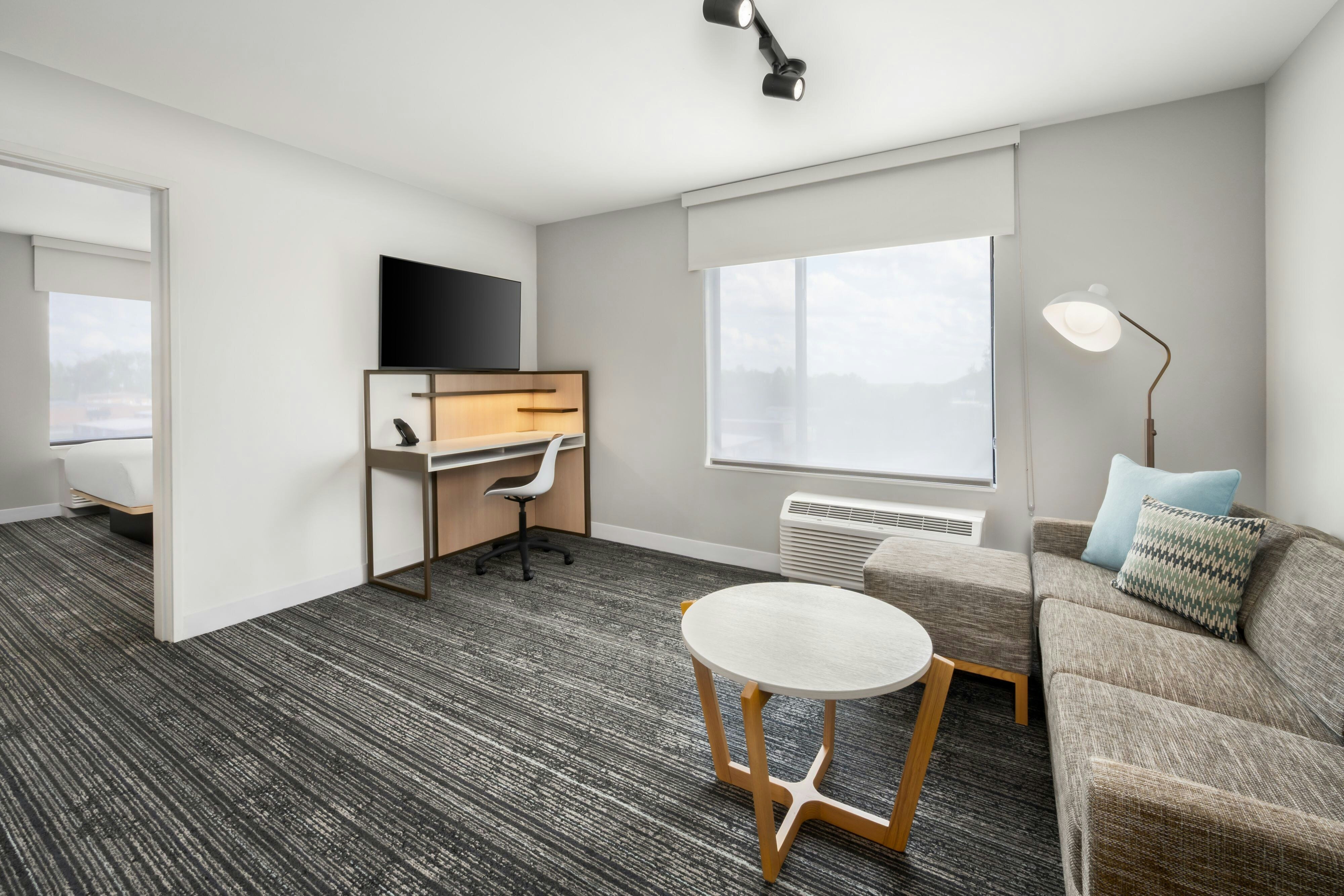 TownePlace Suites by Marriott Millbrook Prattville-guestroom-Modern suite with living area..jpg