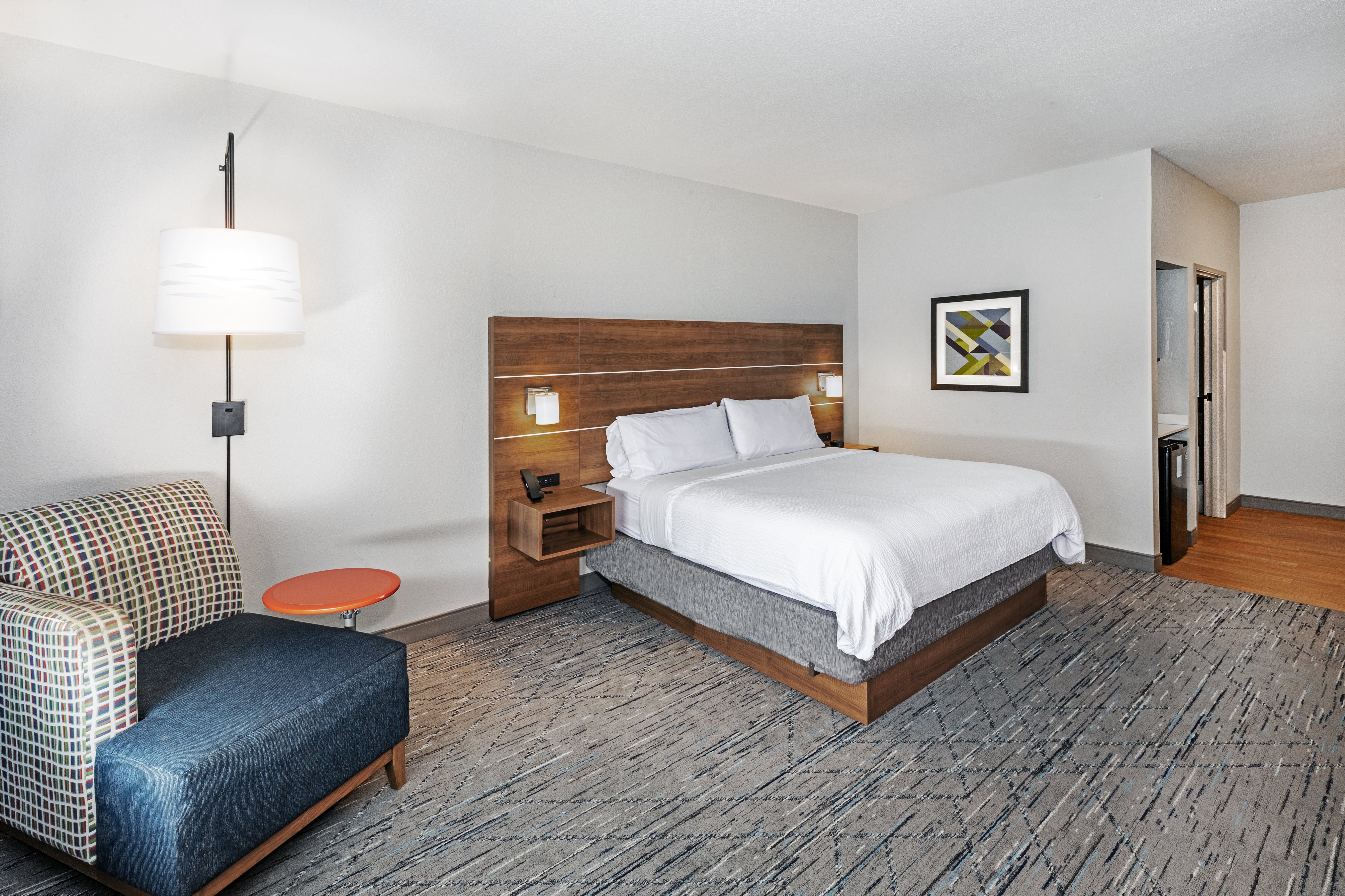 HOLIDAY INN EXP STES BROKEN AR BY I-guestroom-One King Bed Standard.jpg