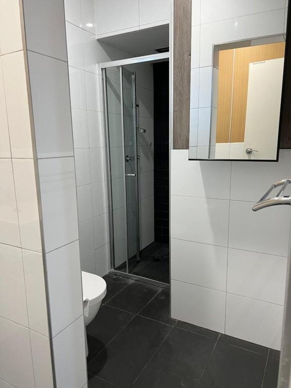 Sea Pavilions-guestroom-Bedroom Apt Shower Area.jpg