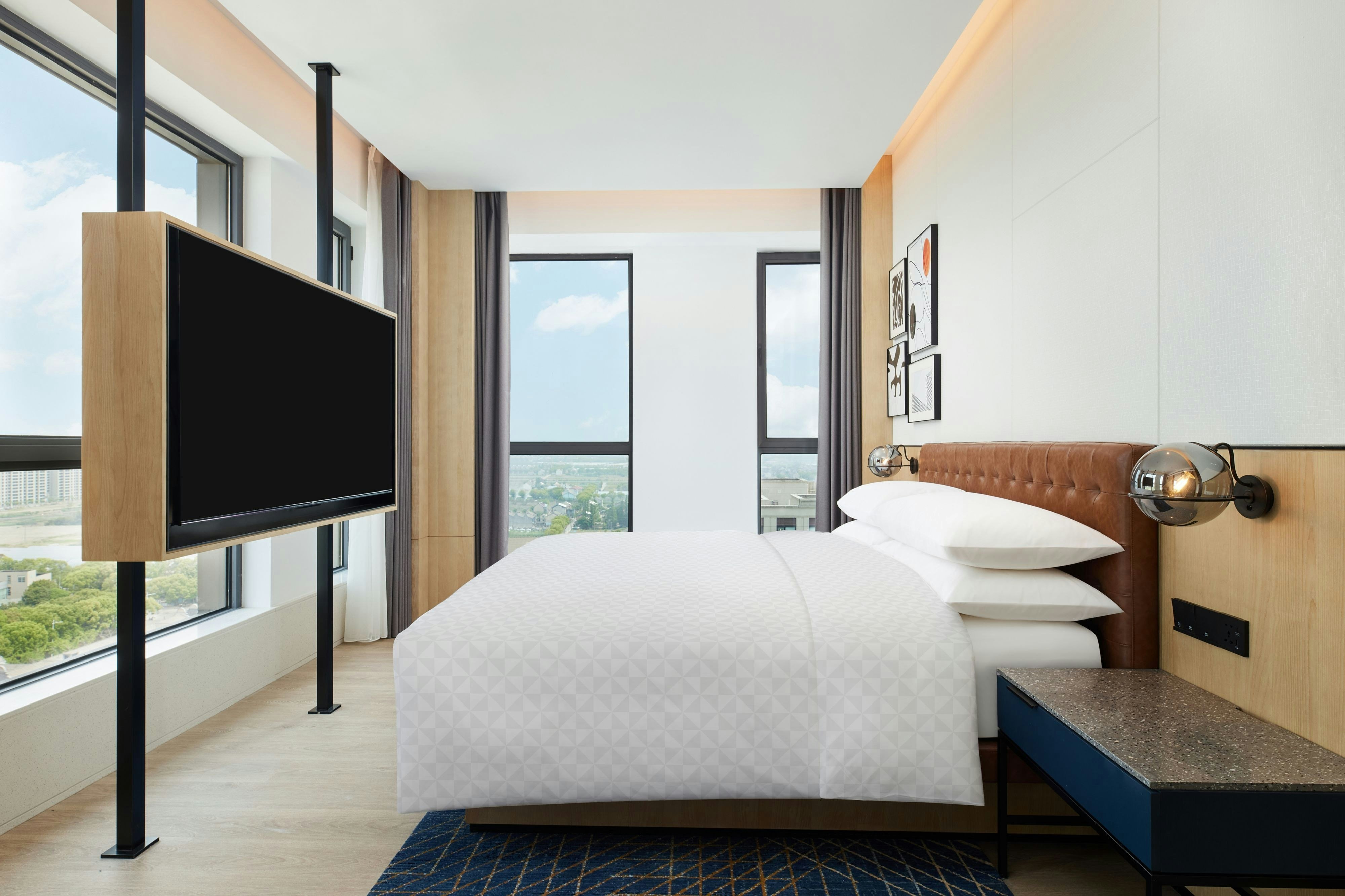TownePlace Suites by Marriott Humble Intercontinental Airport-guestroom-Premier King Suite bedroom.jpg