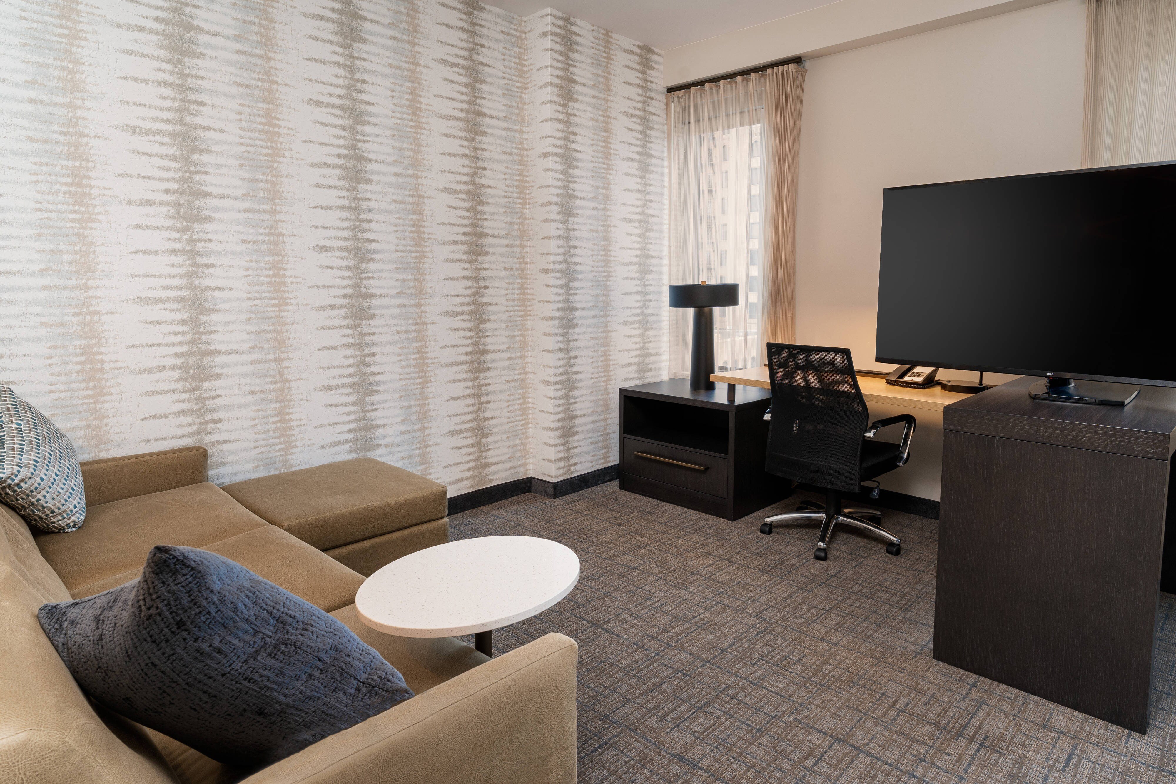 Residence Inn by Marriott Grand Rapids Downtown-guestroom-King Studio Suite - Living Area.jpg