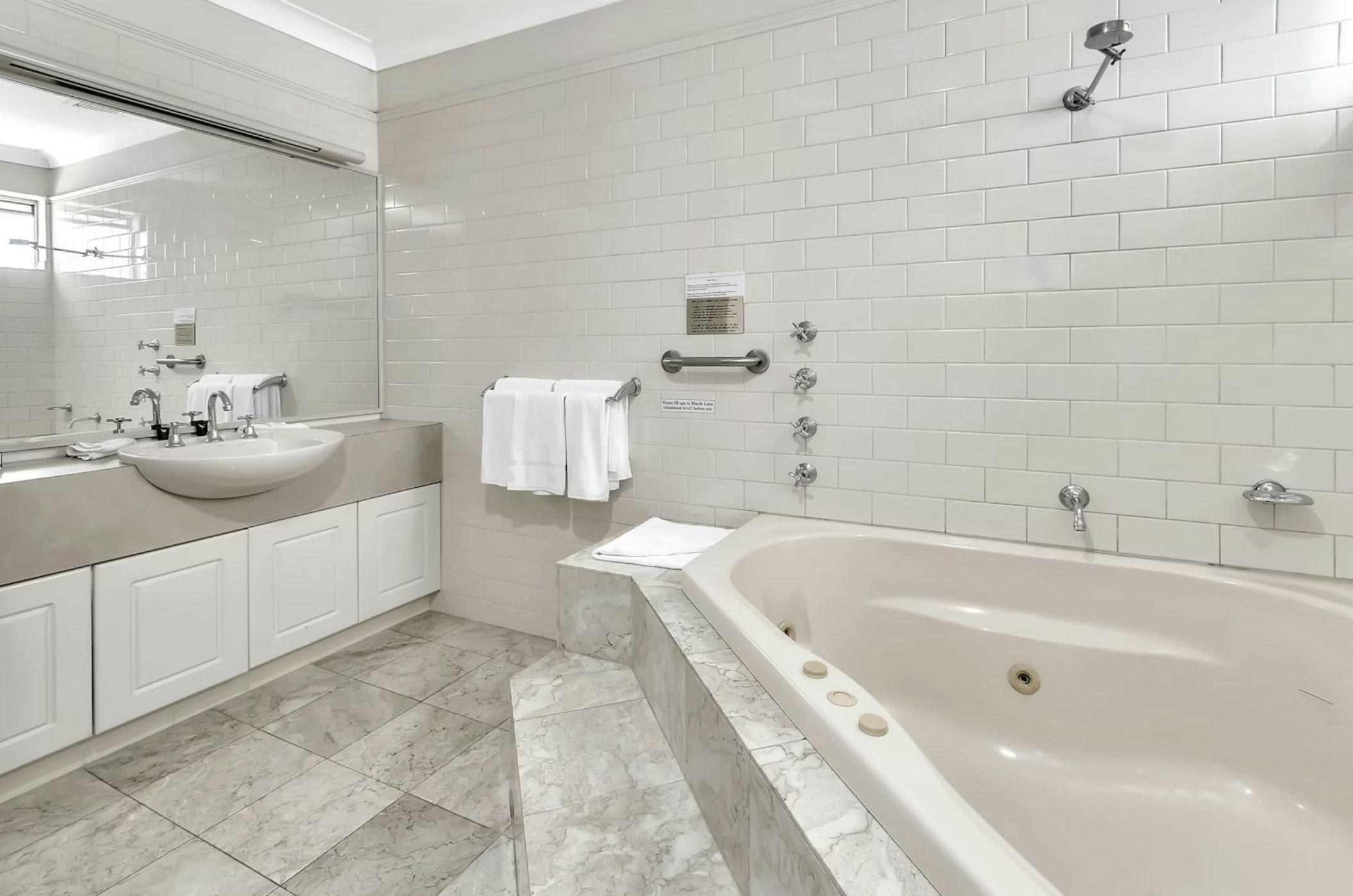 The Clifton Motel-guestroom-King Spa Suite bathroom.jpg