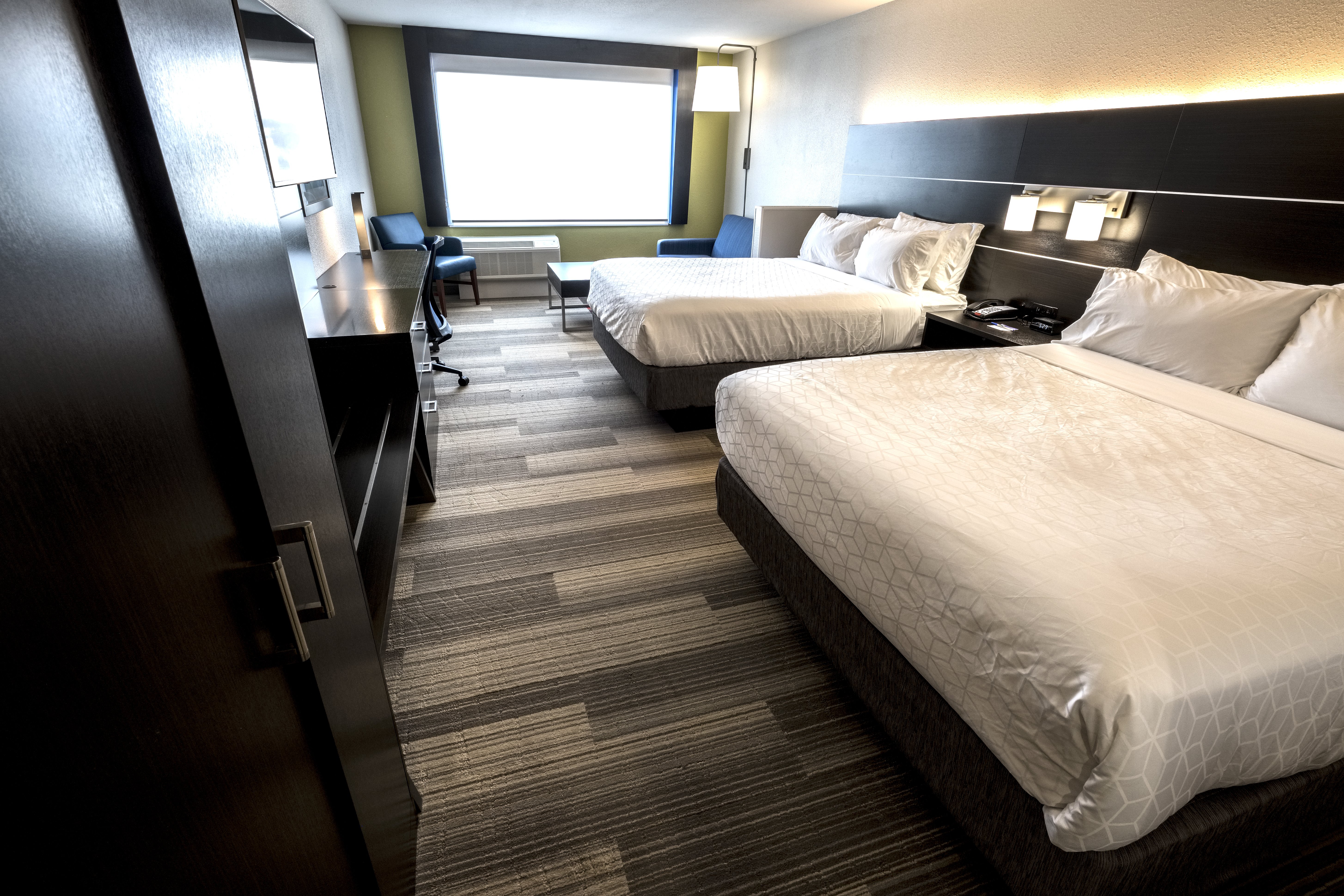 HOLIDAY INN EXP STES COMMERCE BY IH-guestroom-Queen Suite.jpg