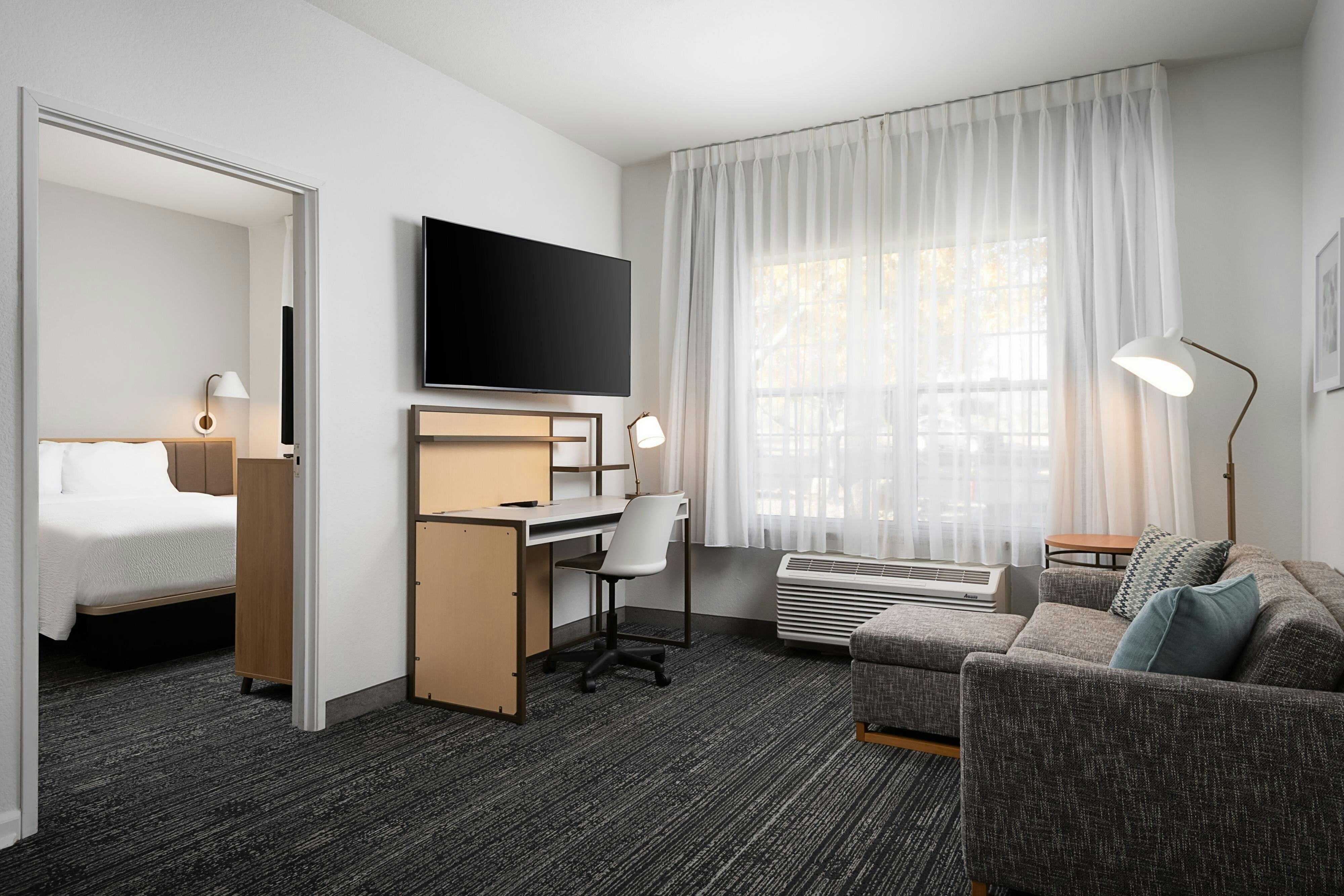 SpringHill Suites by Marriott Thatcher-guestroom-Living Area of one bedroom .jpg