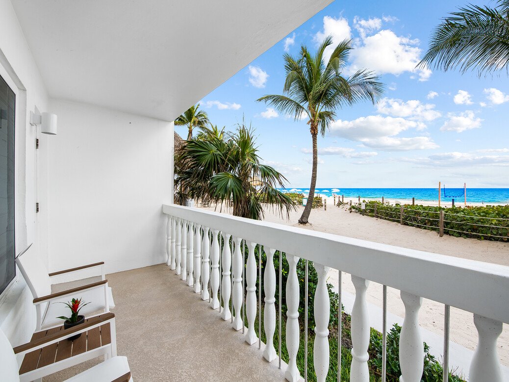 BEACHCOMBER RESORT AND CLUB-guestroom-One Bedroom Oceanfront Suite balcony.jpg
