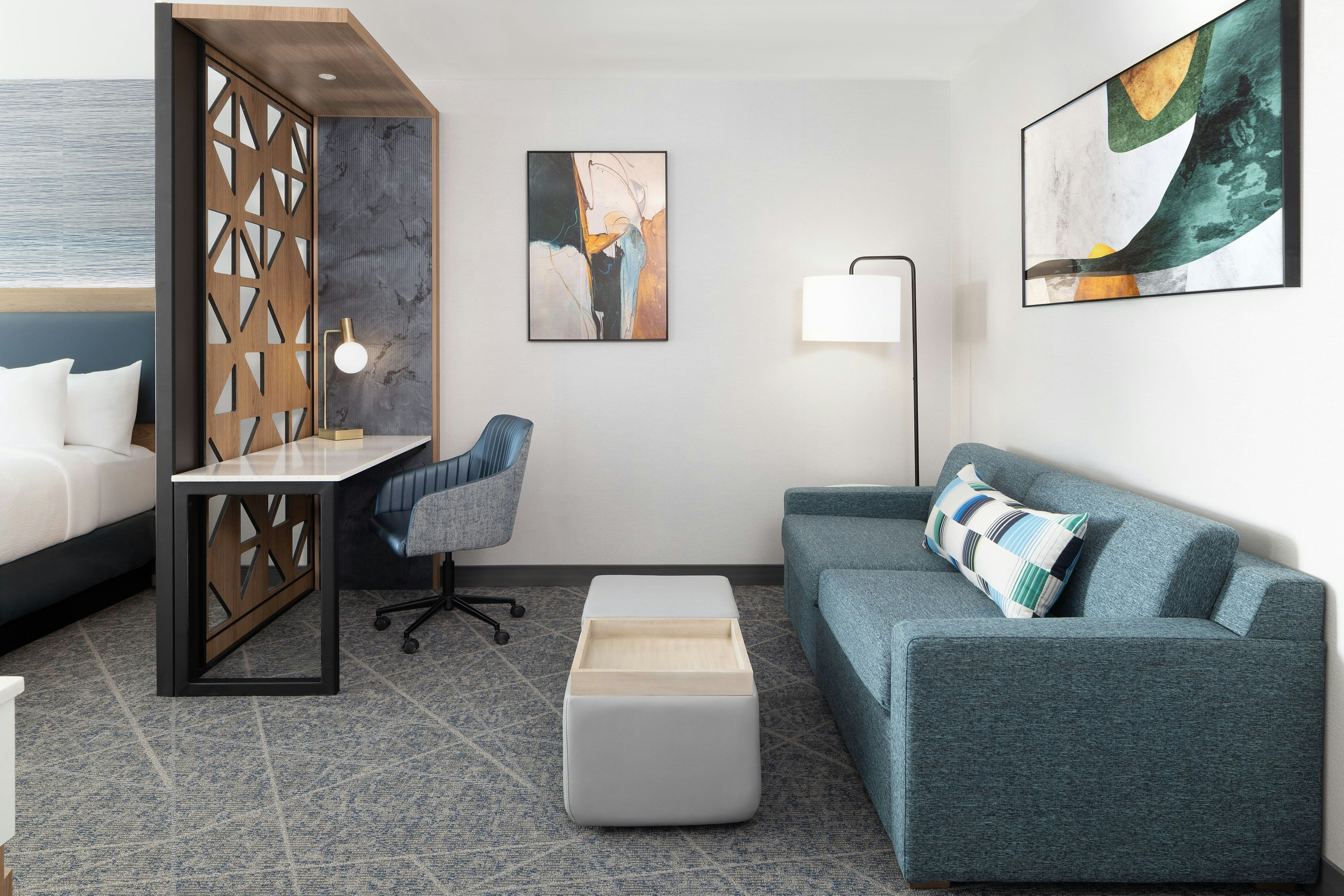 SpringHill Suites by Marriott Atlanta Covington-guestroom-Sofa bed and desk.jpg