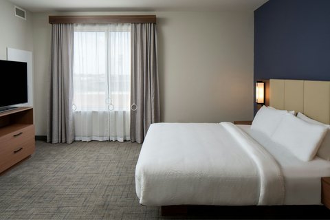Accessible King Suite has Smart TV & amenities.