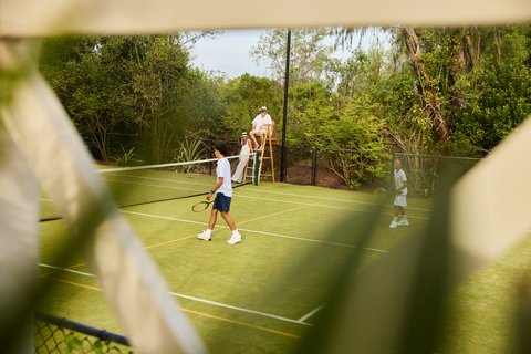 Thanda Island Activities Ginbledon TennisCourt Play Hywell Waters