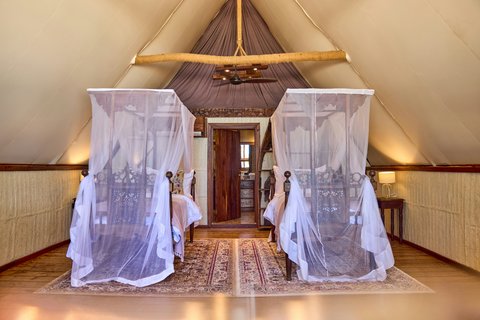 Thanda Island Accommodation Banda Twin Room Mosquito Nets Hywell Waters