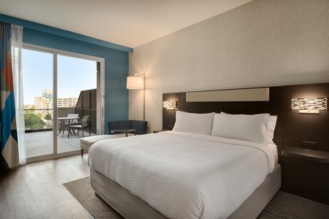 King Standard room with balcony seating in downtown Houston.