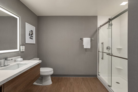 Refresh and recharge in our modern guest bathroom.