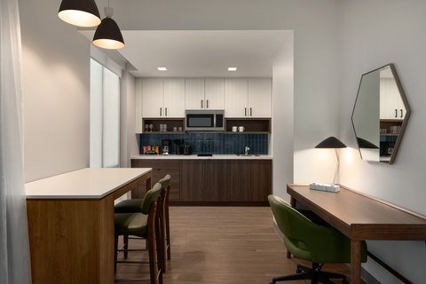 Settle in with a fully equipped kitchen and suite.