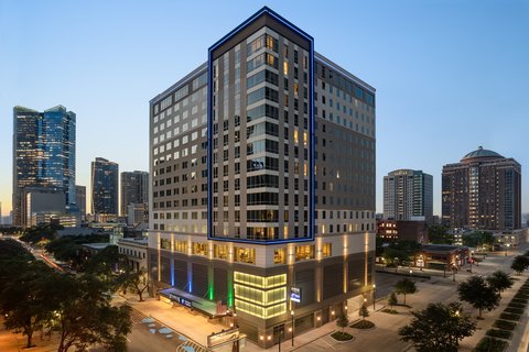 Evening hotel exterior in downtown Houston.