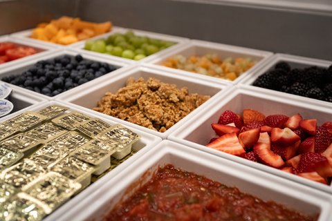 Fresh fruit and granola at our free Houston breakfast buffet.
