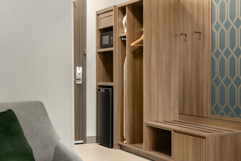 King suite with a closet, microwave, and mini fridge.
