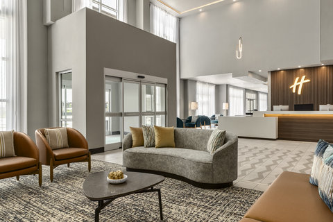 Relaxing lobby lounge at Holiday Inn Commerce City Denver.