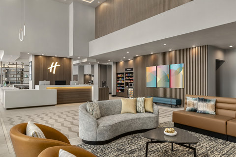Spacious open lobby at Holiday Inn Commerce City Denver.