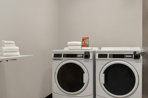 Guest laundry at Holiday Inn Commerce City Denver Airport.
