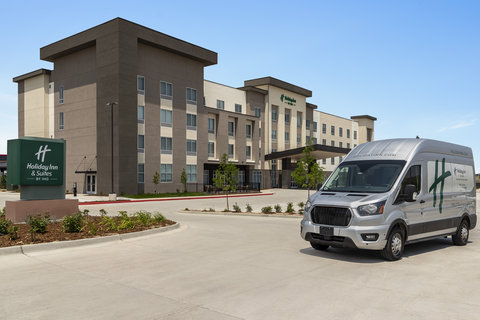 Airport shuttle at Holiday Inn Suites Commerce City Denver.