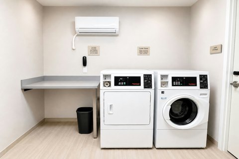 Washer and dryer for guests.