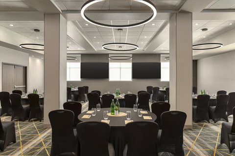 Spacious meeting room with banquet seating for large events.