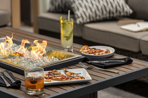 Enjoy onsite dining and drinks by the outdoor fire pit.