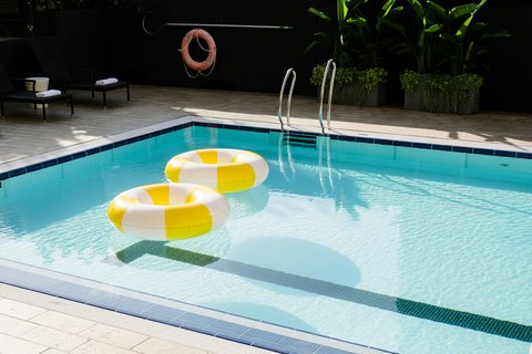 Unwind by the Swimming Pool with Sweeping Brisbane Skyline Views
