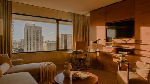 Suite lounge and work space with city views