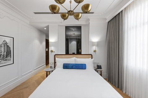 Sink into your comfortable bedding in a room designed for rest.