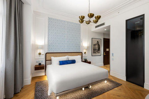 Sink into the crisp white bedding on your spacious king bed