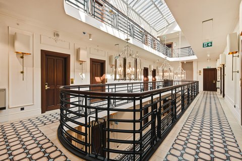Elegant hotel atrium with skylight in central Istanbul
