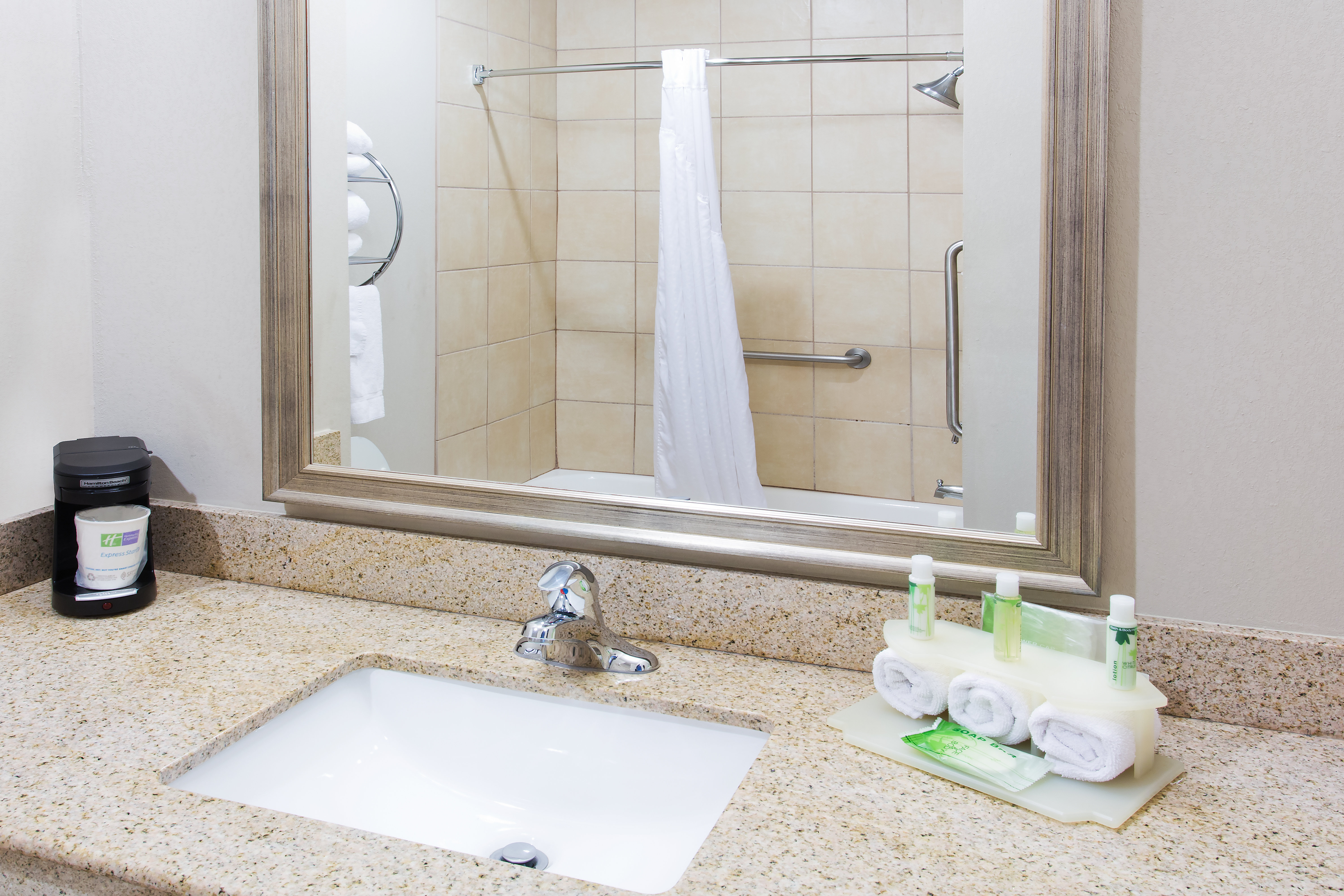 HOLIDAY INN EXPRESS SUITES BY IHG-guestroom-Spacious guest bathroom with tub.jpg