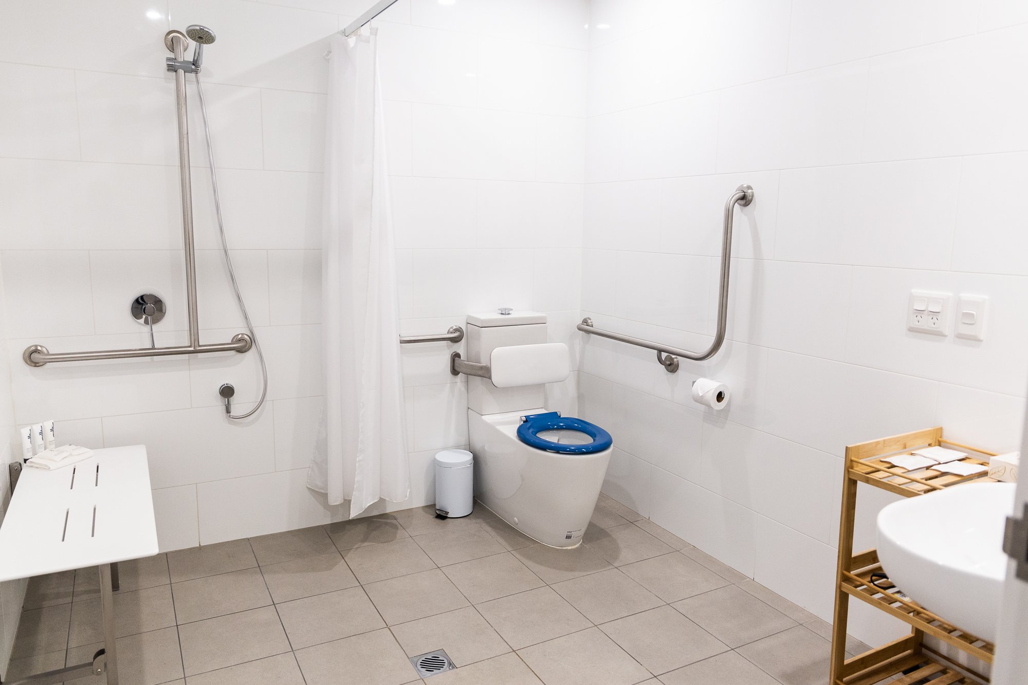 QUEST ORANGE APARTMENTS-guestroom-Accessible Apartment Bathroom.jpg