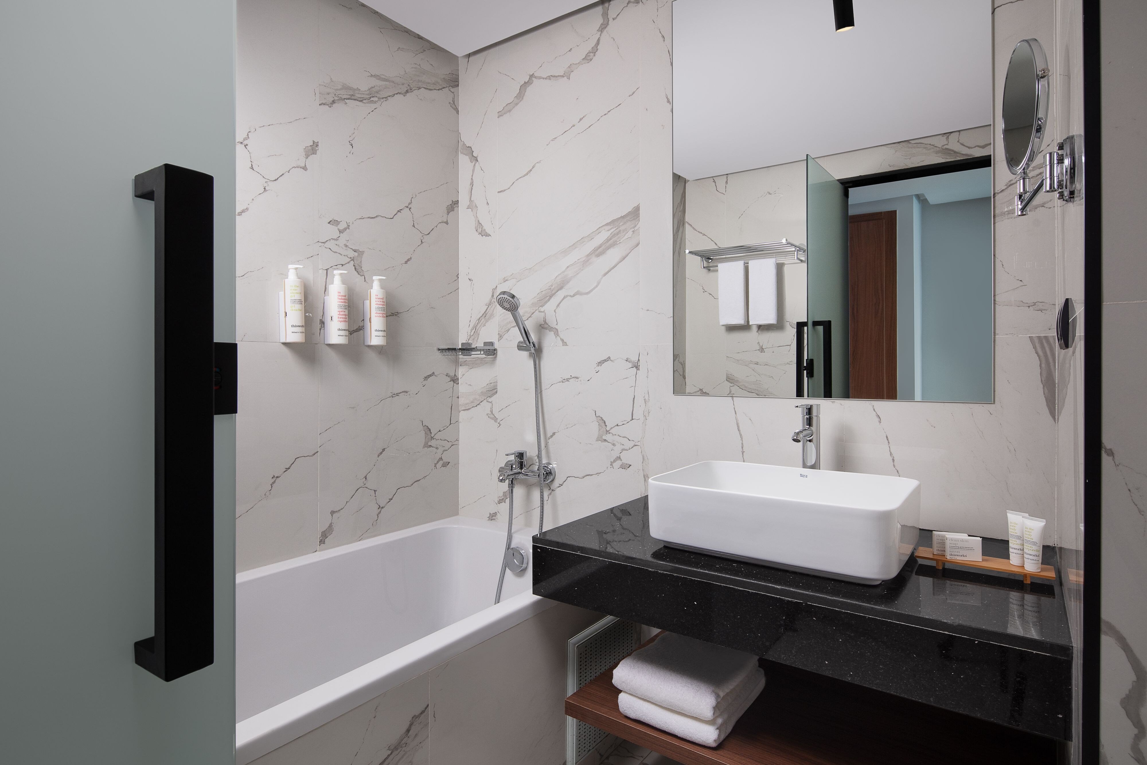 Courtyard by Marriott Casablanca Downtown-guestroom-Suite bathroom with a tub.jpg
