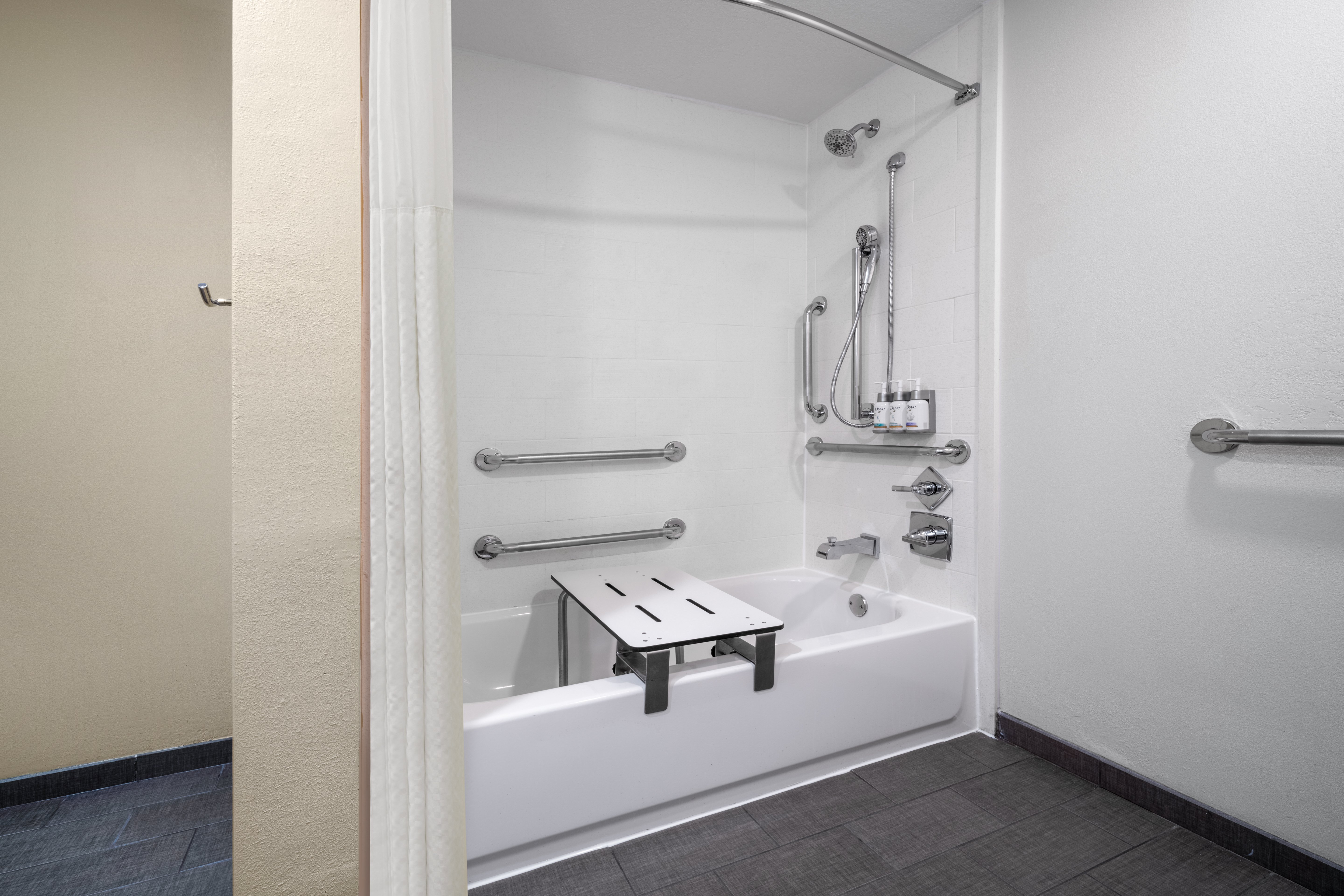 GARNER HOTEL CLARKSVILLE NORTHEAST-guestroom-Spacious accessible guest bathroom with a mobility tub..jpg