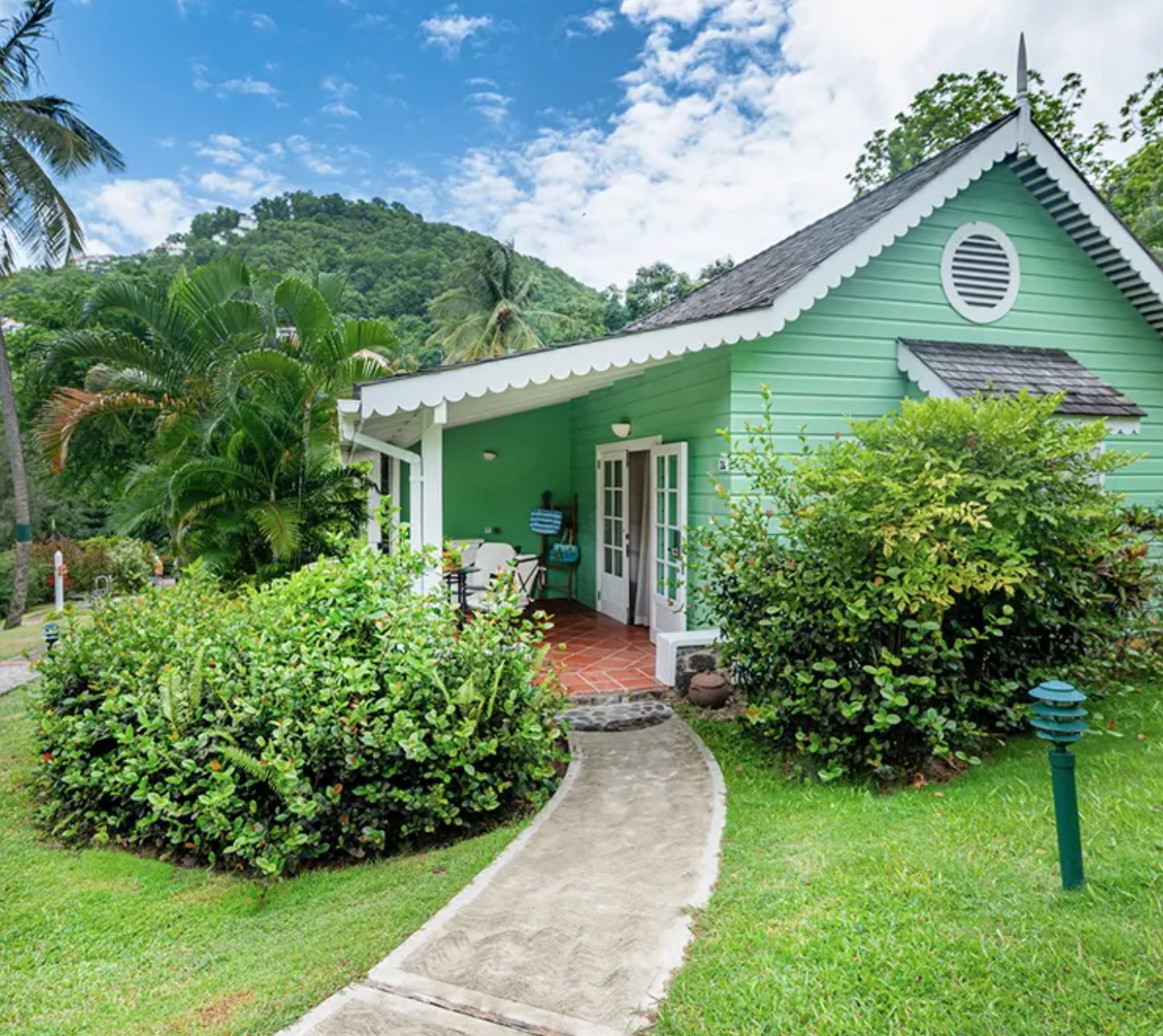 EAST WINDS RESORT LTD-guestroom-Deluxe Cottage Exterior.jpg