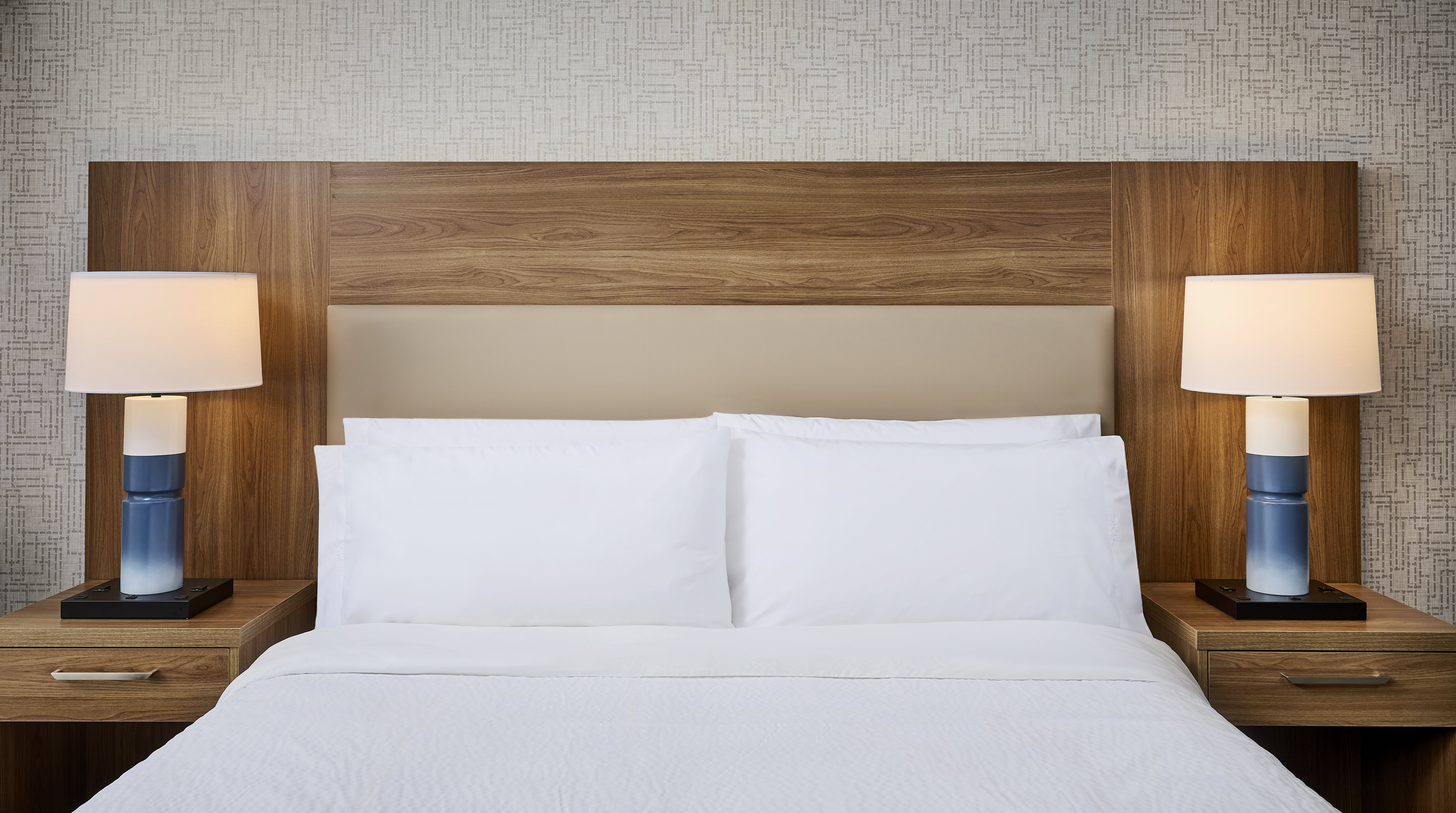 CANDLEWOOD STES BURLINGTON CONFEREN-guestroom-Bedside lamps make for a cozy reading spot..jpg
