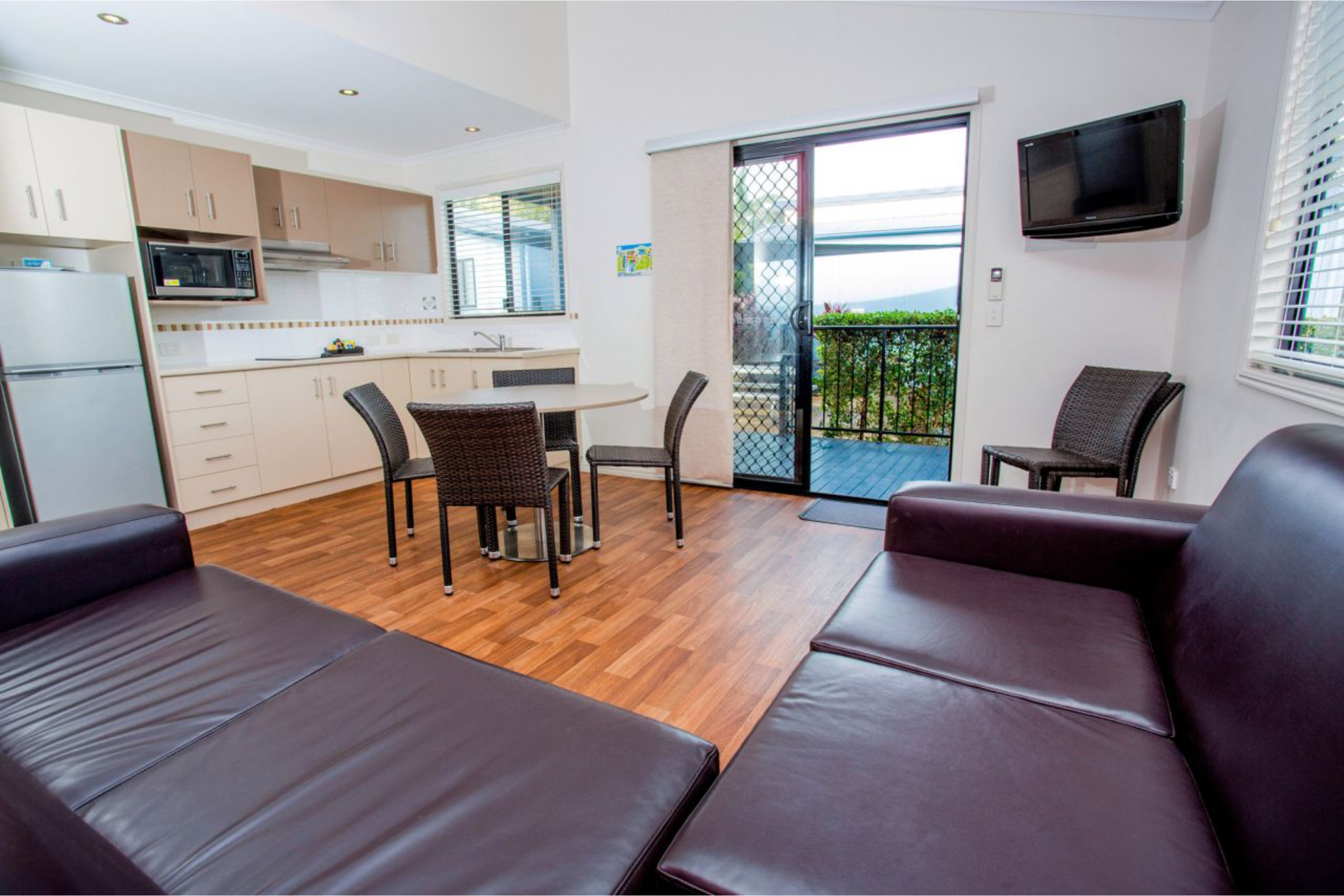 DISCOVERY PARKS - BALLINA-guestroom-Dlx 2BR Cabin (1621) - Living Area.jpg